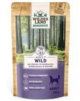 Wildes Land Hund Wild mit Kürbis