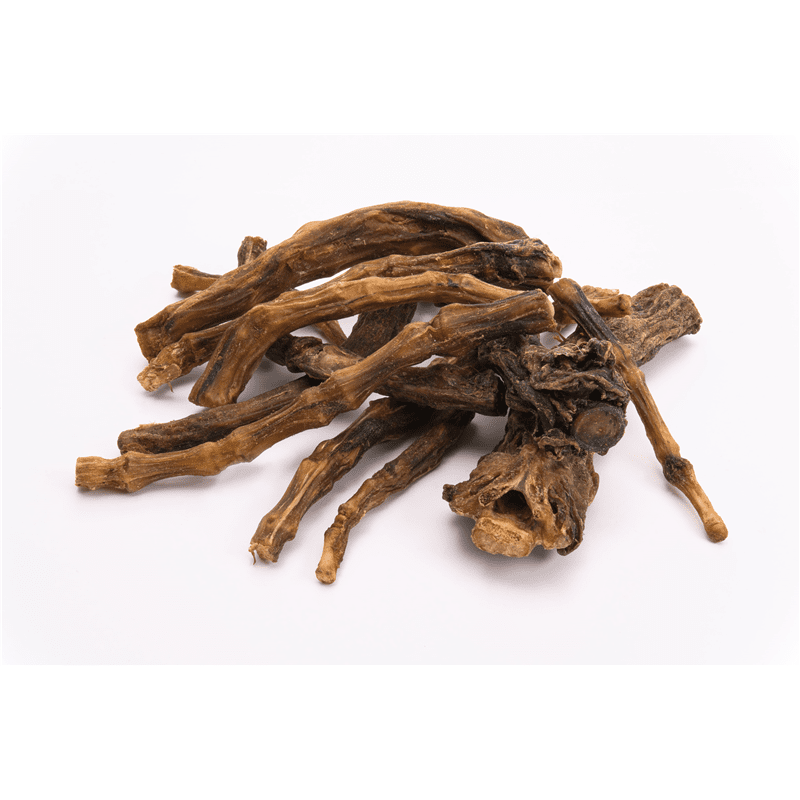 Classic dried beef tail dog treats with fibrous texture and twisted shape