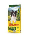 Josera Adult Sea Fish & Rice dog food bag with Border Collie on grassy hill