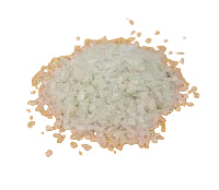Close-up of dry off-white rice flakes for dogs